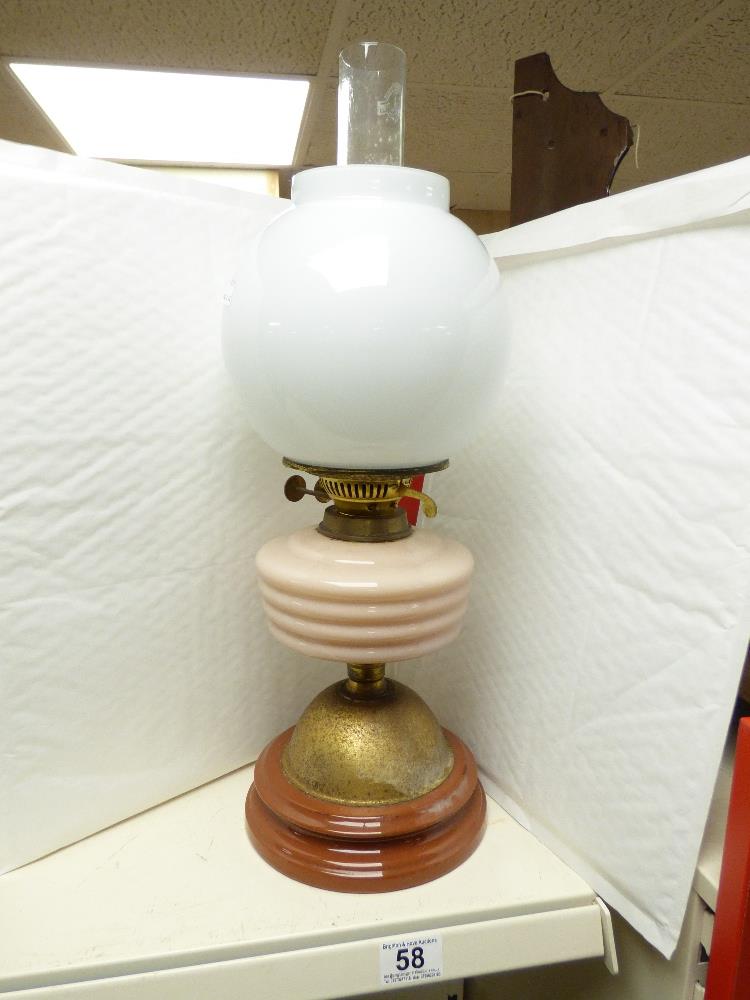A LATE VICTORIAN OIL LAMP