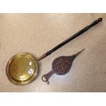 A VICTORIAN BRASS AND COPPER WARMING PAN AND A PAIR OF VICTORIAN CARVED BELLOWS