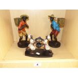 A PAIR OF ASIAN CARRIER FIGURINES AND ANOTHER SMALLER OF RELIGIOUS INCENSE CARRIERS