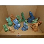 COLLECTION OF TEN SYLVAC RABBITS OF VARIOUS COLOURS AND TWO OTHERS UNMARKED