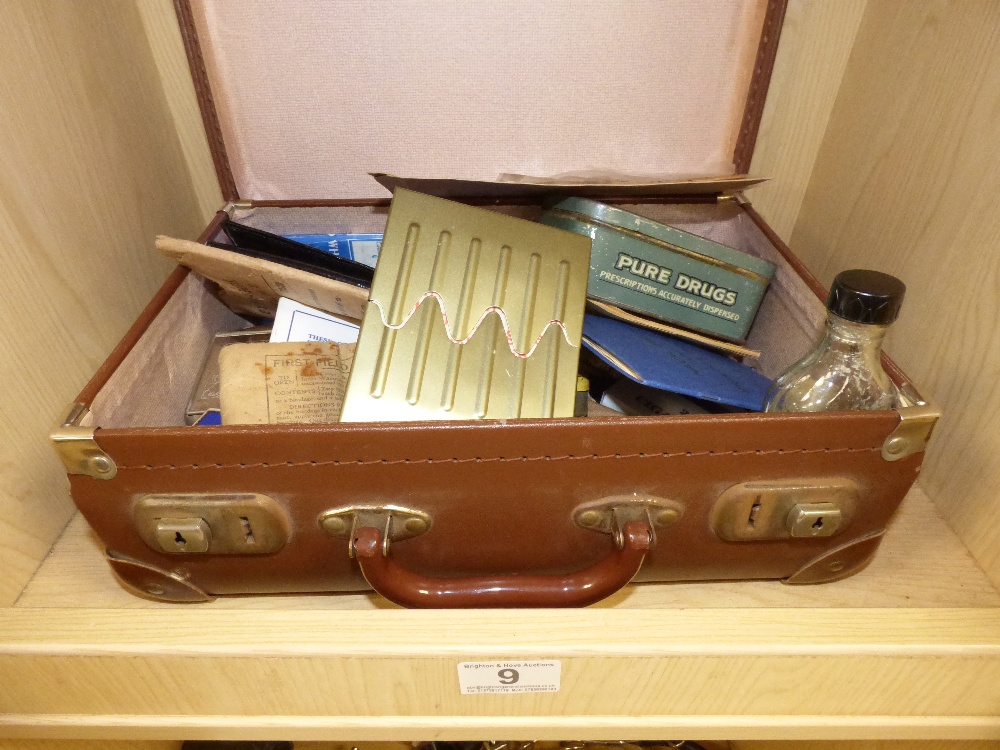 A SUITCASE OF MILITARY ITEMS BOTH ORIGINAL AND REPRODUCED INCLUDING ORIGINAL ANTI-GAS EYESHIELDS