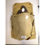 A MILITARY ISSUE GAS MASK IN BAG