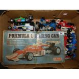 A BOXED FORMULA 1 RACING CAR AND OTHER LOOSE CARS, ALL PLAY WORN