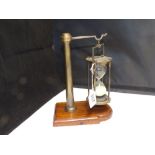 A MAHOGANY AND BRASS SAND TIMER