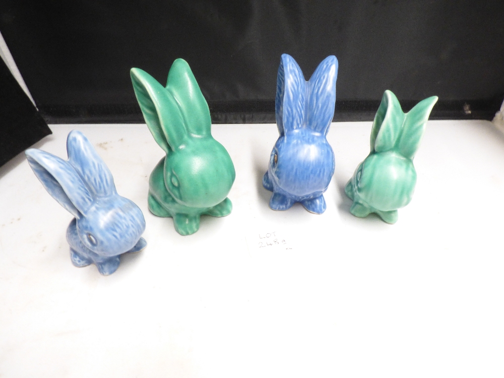 FOUR UNMARKED SYLVAC TYPE RABBITS