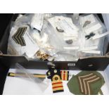A LARGE QUANTITY OF MILITARY REGIMENTAL SEW ON CLOTH BADGES