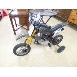 A CHILDS PETROL MOTORCYCLE