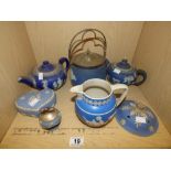 TWO WEDGWOOD BLUE AND WHITE JASPER WARE TEAPOTS, A WEDGWOOD BISCUIT BARREL, A COPELAND SPODE JUG AND