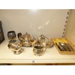 SILVER PLATED WARES INCLUDING A TEAPOT AND CUTLER, SUGAR SCUTTLE AND ENTRE DISH
