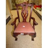 A CHIPPENDALE STYLE MAHOGANY ELBOW DOLL'S CHAIR, 50CM HIGH