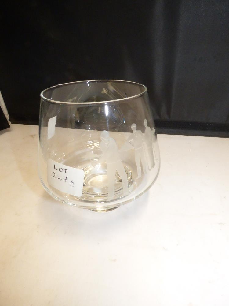 A CAITHNESS ENGRAVED GOLFING BRANDY GLASS