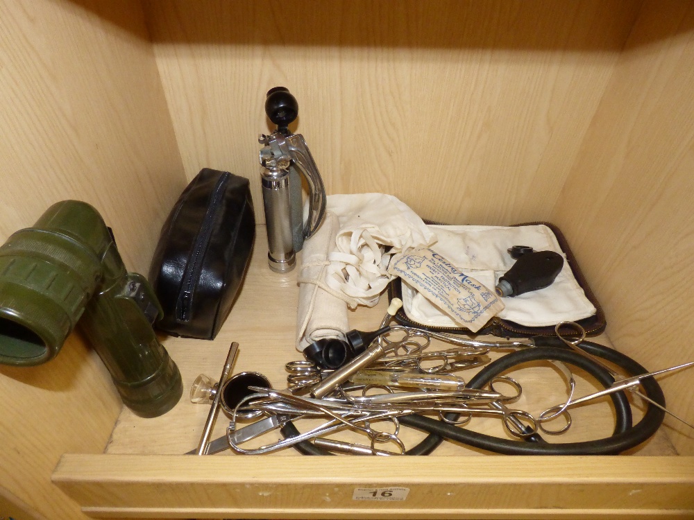 A QUANTITY OF MEDICAL AND SURGEONS TOOLS AND SURGEONS' MASK