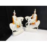 TWO VICTORIAN STAFFORDSHIRE EQUESTRIAN FIGURE GROUPS, 30CM