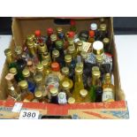 A QUANTITY OF MINIATURE BOTTLES OF SPIRITS INCLUDING WHISKY AND LIQUERS