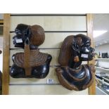 TWO TRIBAL CARVED BUSTS