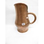 A VINTAGE BEATEN COPPER WATER JUG, 32CM