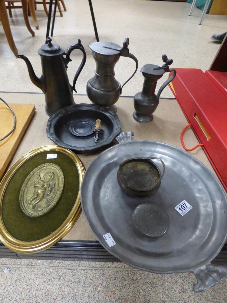 TWO PEWTER POSSIBLY ZINN DISHES BOTH MARKED, THREE PEWTER FLAGONS, A BRASS PLAQUE AND A NUMBER OF