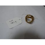 A GOLD SOVEREIGN RING, SHANK MARKED 375 (6.4 GRAMS)