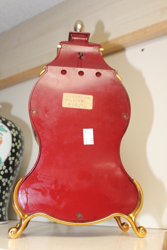 A REPRODUCTION FRENCH BOMBE SHAPED CLOCK AND SHELF WITH HAND PAINTED FLORAL DECORATION - Image 3 of 4