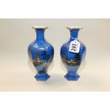 A PAIR OF MOONLIGHT WARE CERAMIC VASES STAMPED 613, MADE IN ENGLAND 19.5CM HIGH
