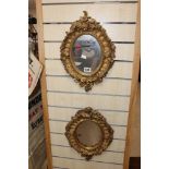 PAIR OF ORNATE GILDED VICTORIAN VICTORIAN OVAL MIRRORS WITH MERCURY GLASS