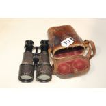 A PAIR OF EARLY 20TH CENTURY MILITARY BINOCULARS BY BAROUX & BION LTD, LONDON, ETCHED MARKS TO