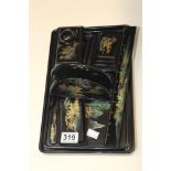 AN ORIENTAL LACQUERED WOOD DESK SET, INCLUDING INK WELL, PEN TRAY, RULER AND MORE