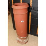 A TERRACOTTA CHIMNEY 90CMS