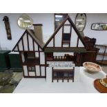 A LARGE TUDOR STYLE DOLLS HOUSE A/F