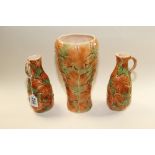 A PAIR OF SYLVAC ORNAMENTAL JUGS TOGETHER WITH A MATCHING VASE. PATTERN NO. 5501/2, VASE HEIGHT