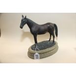 A 20TH CENTURY SPELTER FIGURE OF A HORSE RAISED ON A MARBLE STYLE BASE, 27CM HIGH