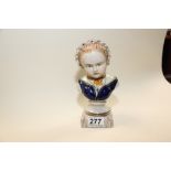 A PAIR OF EUROPEAN CERAMIC BUSTS OF A BOY AND GIRL, 21CM HIGH