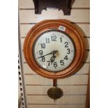 AN EARLY 20TH CENTURY WALL CLOCK OF CIRCULAR FORM, 41.5CM WIDE