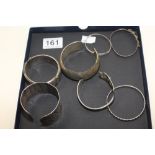 7 VARIOUS BANGLES INCLUDING 2 SILVER EXAMPLES, 40G