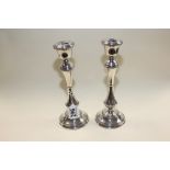 A PAIR OF SILVER CANDLESTICKS HALLMARKED BIRMINGHAM 1964 BY W I BROADWAY AND CO, 26.5CM HIGH 1200G