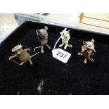 AN UNUSUAL GROUP OF FOUR PAINTED MINIATURE METAL FIGURES OF RATS STANDING IN DIFFERENT POSES,