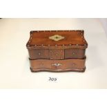 A WOODEN JEWELLERY CASKET WITH BRASS DETAILING THROUGHOUT, 19.5CM WIDE