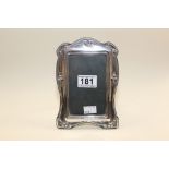 AN ART NOUVEAU SILVER MOUNTED RECTANGULAR PHOTO FRAME, HALLMARKED BIRMINGHAM 1989 MAKERS MARK PJP,