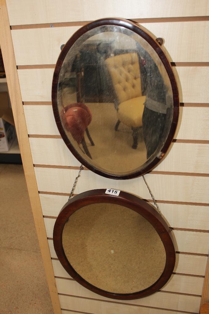 TWO MAHOGANY OVAL MIRRORS APPROX 40CM X 50CMS