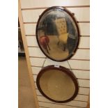 TWO MAHOGANY OVAL MIRRORS APPROX 40CM X 50CMS