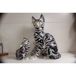 TWO 1960S MANICIOLI ITALIAN POTTERY BLACK AND WHITE CATS, ONE 58CM TALL, THE OTHER 21CM TALL