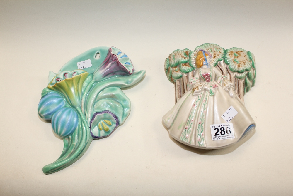 TWO CLARICE CLIFF CERAMIC WALL PLAQUES , THE LARGEST 25CM LONG