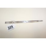 A SILVER PAPER KNIFE, THE HANDLE IN THE FORM OF A RULER, HALLMARKED LONDON 1979 BY S J ROSE &