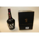 BOTTLE OF VAT 69 SCOTCH WHISKY TOGETHER WITH AN EMPTY BOXED CERAMIC QE2 12 YEAR BOTTLE