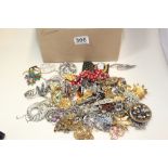 A COLLECTION OF VARIOUS COSTUME JEWELLERY, INCLUDING TWO SILVER BROOCHES, NECKLACES, EARRINGS AND