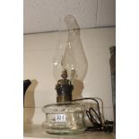 AN ELECTRIC OIL STYLE GLASS LAMP