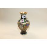 AN ORIENTAL CLOISONNE ENAMEL VASE OF BALUSTER FORM WITH RELIEF DECORATION THROUGHOUT, 21CM HIGH