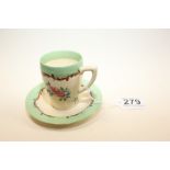 A CLARICE CLIFF TEACUP AND SAUCER