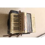 A VISSIMIO ACCORDION AND CASE