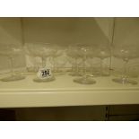 A SET OF TEN BACCARAT CRYSTAL GLASS CHAMPAGNE SAUCERS, EACH WITH ETCHED DECORATION OF FLOWING
